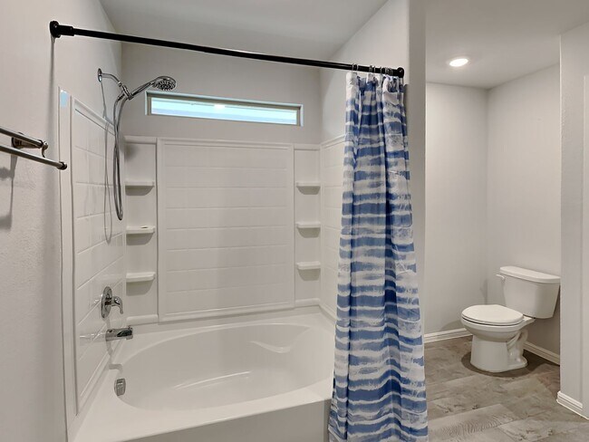 Building Photo - Chapel Creek Beauty with Designer Kitchen, Spacious Layout & Private Backyard Retreat!