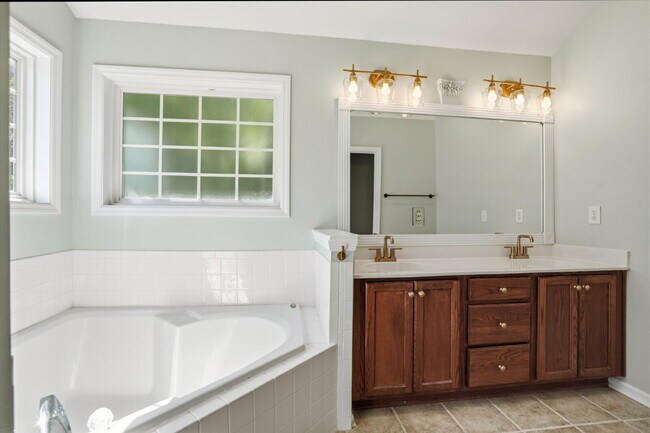 Building Photo - "Exquisite 4-Bed Sanctuary with Cozy Fireplace & Spacious 2,204 Square Foot Layout on Willoughby ...