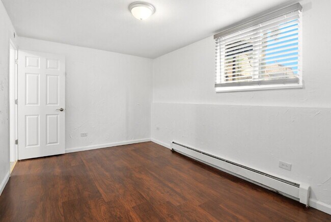 Building Photo - $1,520.95 - 2 bed, 1 bath updated ground floor Condo in Lakewood with In Unit Laundry