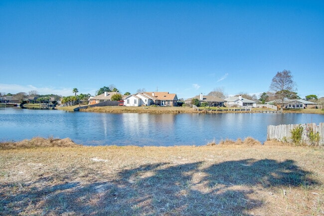 Building Photo - Lakefront 3BR/2BA Home on Orion Lake with Florida Room, Screened Patio, Hot Tub (As-Is), Solar Pa...