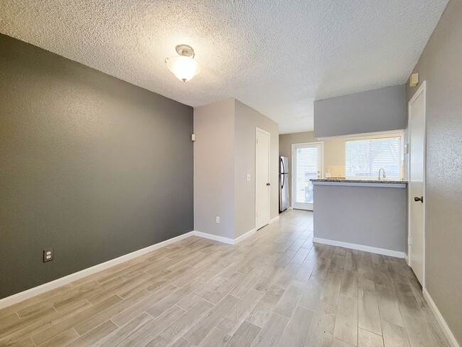 Building Photo - Welcome to This Charming Townhome Nestled ...