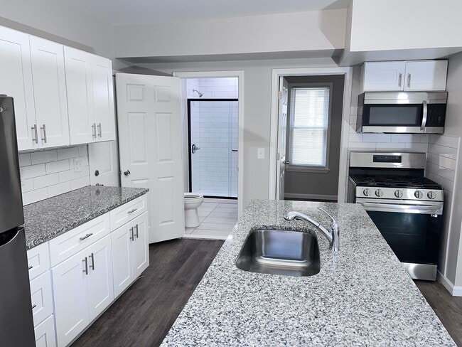 Building Photo - The Duplex on Plumer: Where Modern Meets M...