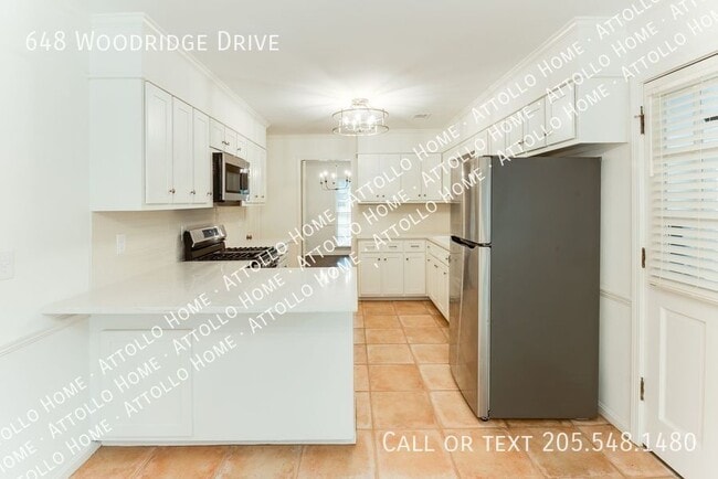 Building Photo - 648 Woodridge Dr