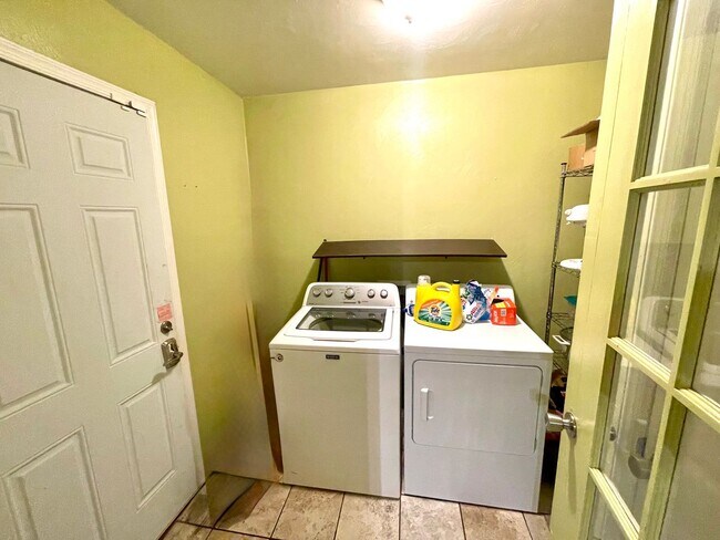 Building Photo - Spacious Home with Large Yard, Hot Tub, and More