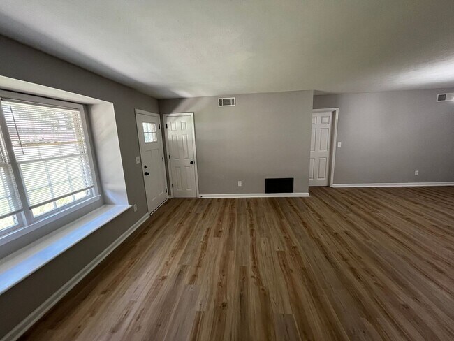 Building Photo - Must See the Sunroom off the Primary Bedroom!