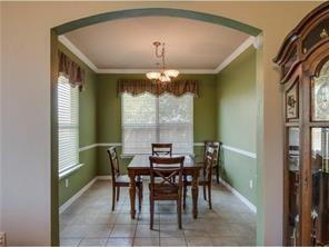 Building Photo - Former model home on corner lot is ready for move in!