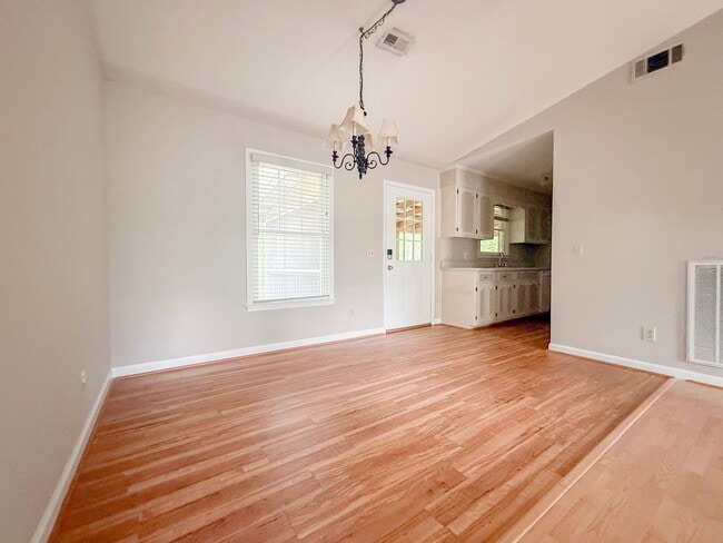 Building Photo - Spacious 3-Bedroom Home with Screened Porch, 2-Car Garage + Workshop