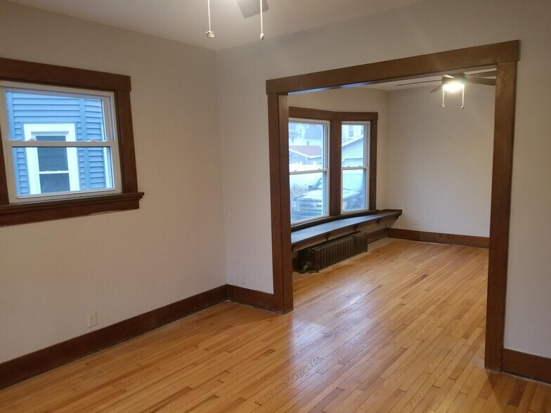 Living room to dining room - 2045 E Washington Ave