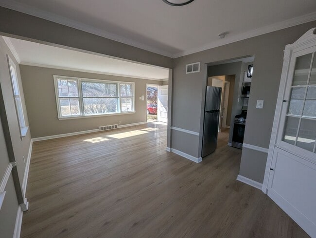 Building Photo - Fully Renovated Home with Sunroom, Garage & Huge Fenced Yard