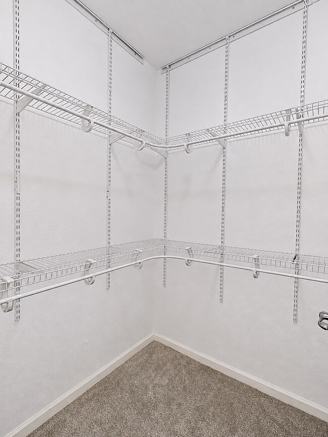 Building Photo - Spacious 2-Bedroom Condo with Garage, Fireplace, Pool & Most Included Utilities