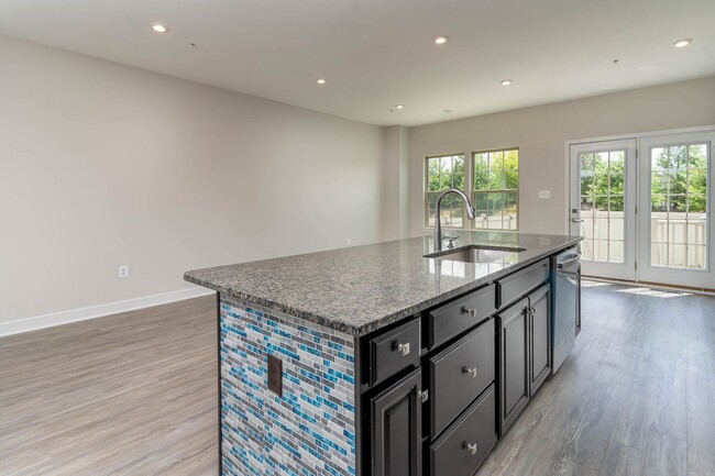 Building Photo - Townhouse with 1-Car Garage, Rooftop Deck ...