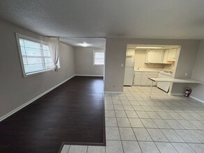 Building Photo - Affordable Apartment 1/2 Block from Campus!