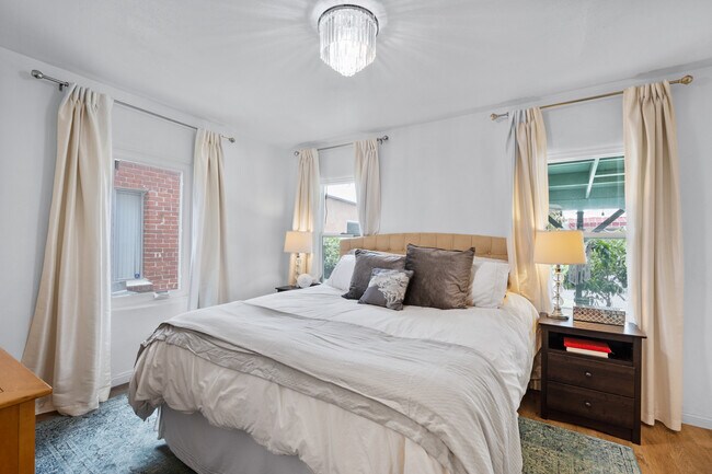 Master bedroom with walk-in closet and plenty of storage. California King Bed - 1150 W 25th St