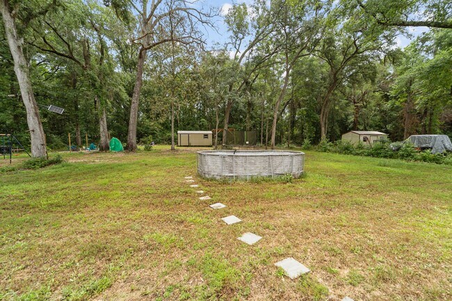 Building Photo - Comfort & Style Meet in This Beautiful 4 Bedroom Midway Home