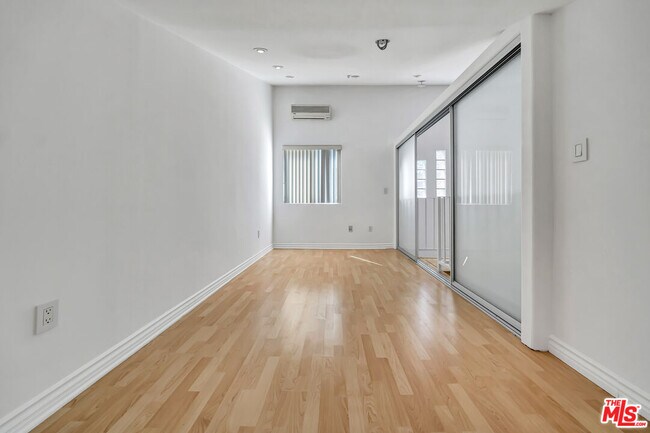 Building Photo - 4477 Woodman Ave