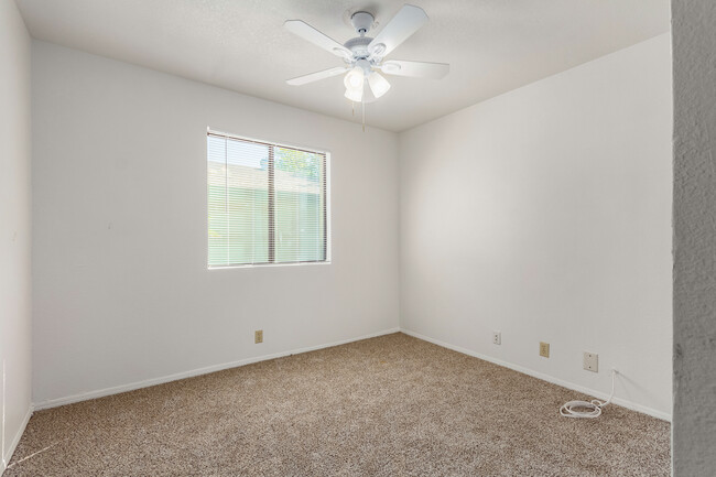 Downstairs bedroom w/ceiling fan - 3748 W Carol Ann Way