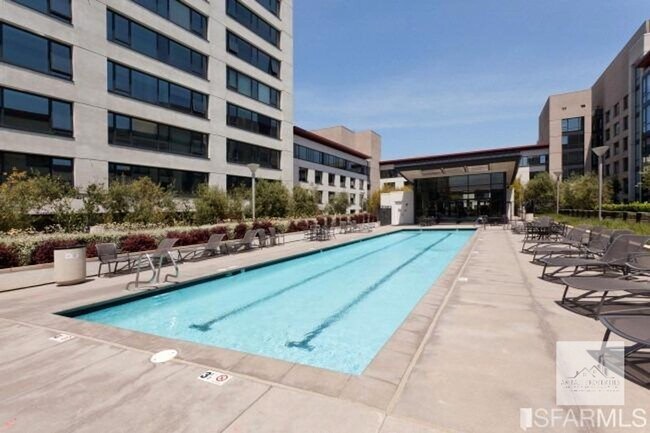 Building Photo - Spacious One-Bedroom Elegance in a Luxury Doorman Building with EV Parking