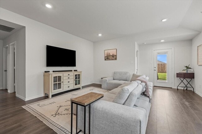 Building Photo - Modern single-story home with 4 bedrooms, 2 bathrooms, open-concept living, stylish kitchen, two-...