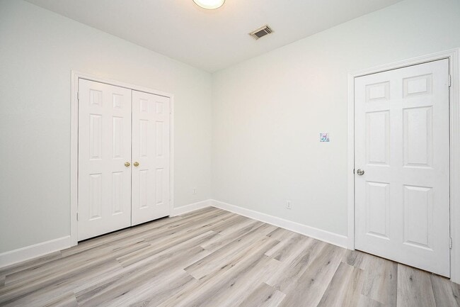 Building Photo - Discover this stunning one-story corner lo...