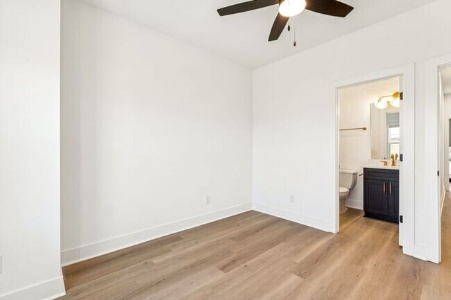 Building Photo - High-End 2BR Townhome | Rooftop Terrace + 2-Car Garage | 24-Unit Community