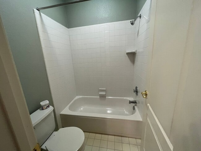 Building Photo - 4 bedrooms with 3 car garage in Rose Lane ...