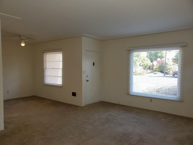 Building Photo - Room for rent with a charming Normal Heights house with garage and large yard.