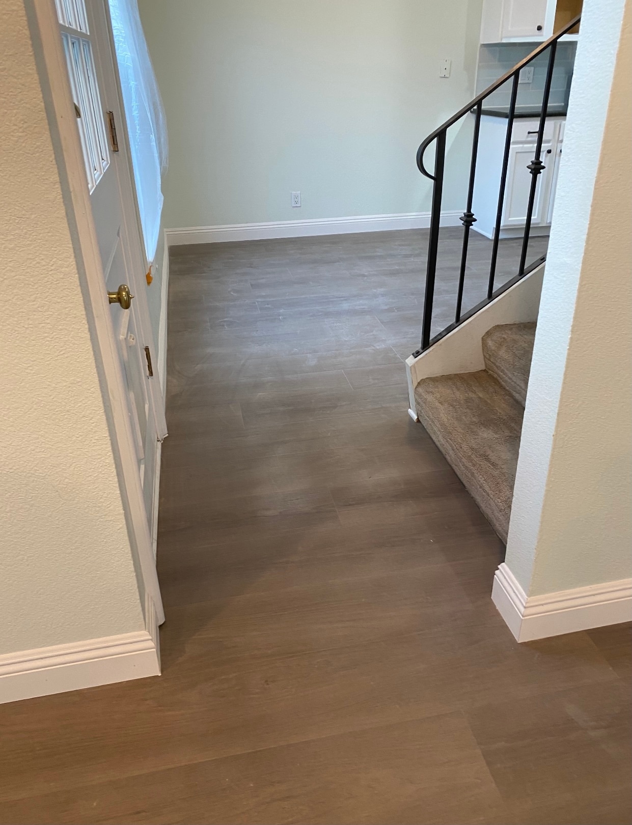 New floor in the entryway and the stairs with carpet - 1845 Anaheim Ave