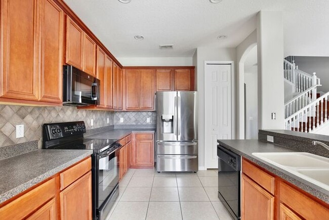 Building Photo - Spacious 4/2.5 Townhome in Gated Community in Avalon Park - Orlando