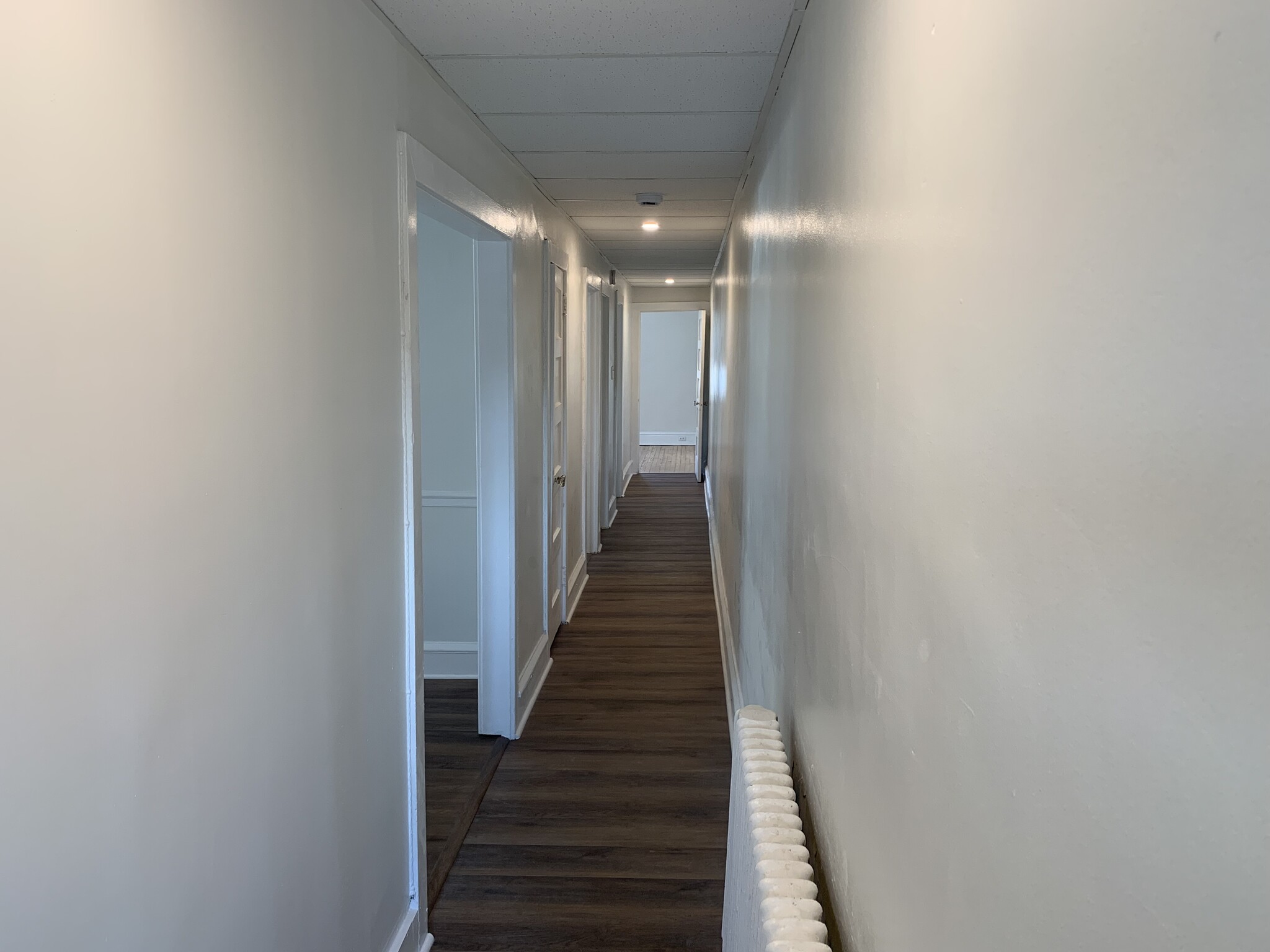 New vinyl flooring down hallway - 2030 Darby Rd