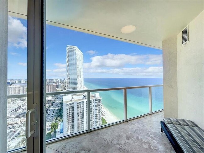 Building Photo - 16699 Collins Ave