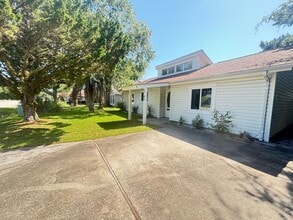 Building Photo - PET-FRIENDLY, THREE-BEDROOM IN SURFSIDE BEACH'S CAROPINES COMMUNITY IS AVAILABLE NOW!