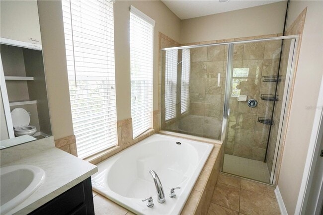 Building Photo - Beautiful 4BR/3.5BA Home with Dual Primary Suites in Harmony for Rent!