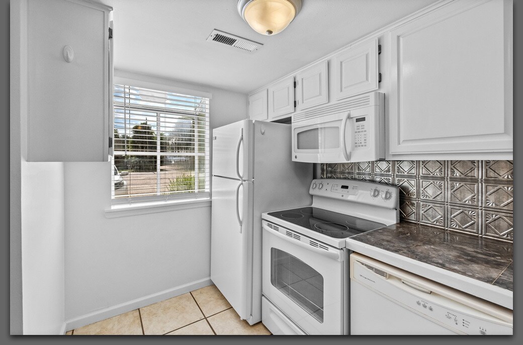 Kitchen looking Southeast - 1519 N Leverett Ave