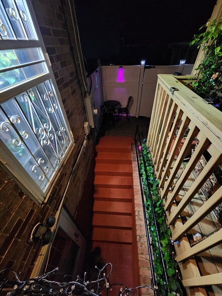 Steps at night to unit - 12809 E Shelby Ln