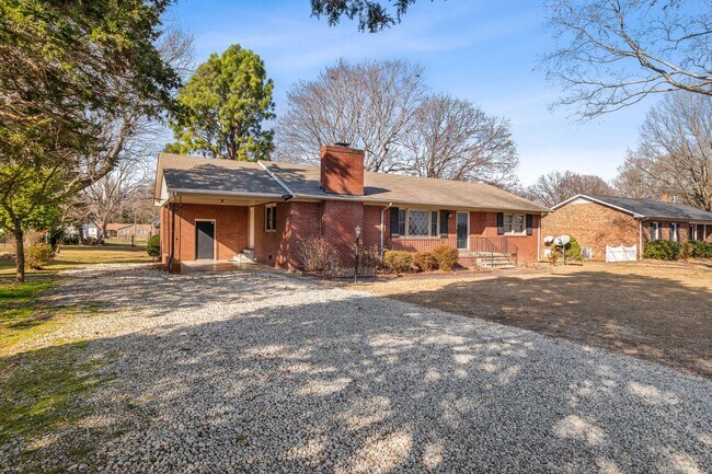 Building Photo - Elon - Large Brick Home, Hardwoods, Granite Counter-Tops, SS Appliances, Fire Place, Carport - Mu...