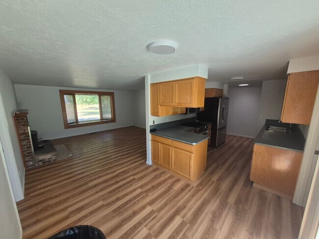 Building Photo - Refurbished home with Basement and large yard