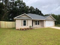Building Photo - Just like New 3/2 - Custom Quality Constru...
