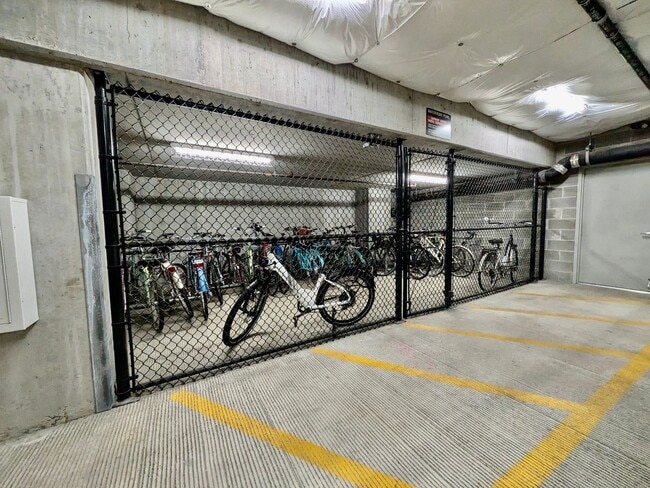 Building Photo - Exquisite Condominium at the Renowned Waterfront Pearl with Views of the River, Work Out Facility...