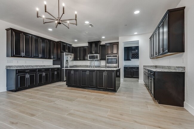 Building Photo - Welcome to your dream home located in the prestigious guard-gated community of Tuscany in Henderson!