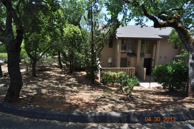 Front of Townhome #E.. Exterior to be repaired & repainted by 9/30/2026 or sooner per the HOA - 13059 Lincoln Way