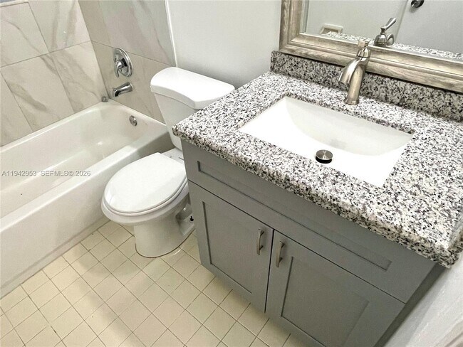 Building Photo - 10992 Royal Palm Blvd