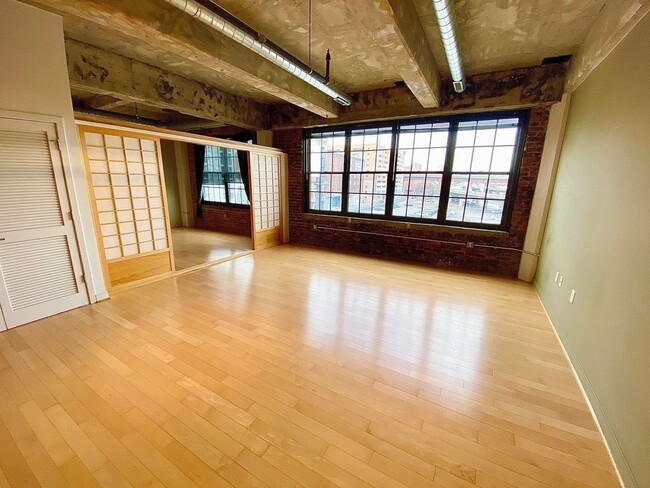 Building Photo - Stunning Industrial-Contemporary One Bedro...