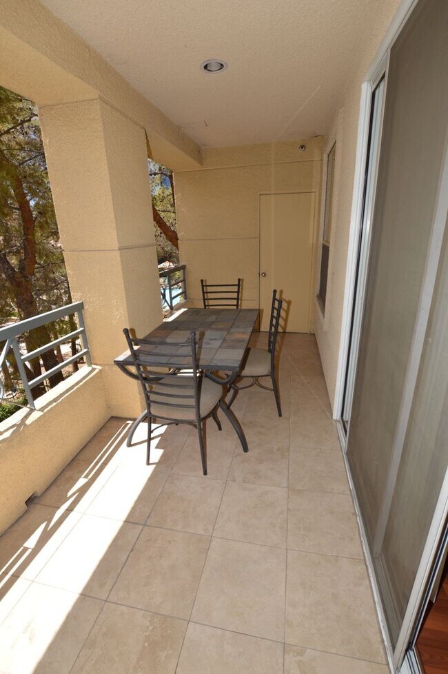 Building Photo - Meridian STUDIO Condo Fully Furnished w/Main Pool View-Lush Green trees in Resort Style Community.