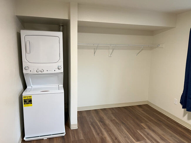 Closet and washing machine - Cedar Park Apartments