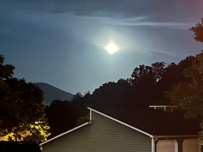 Moon over Eastwood Village Condos, a safe, neighborly community conveniently located - 2000 Olde Eastwood Village Blvd