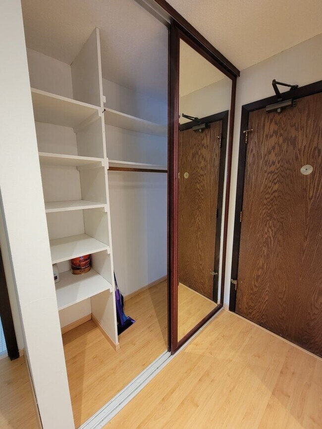 Building Photo - Newly Updated 1 Br/1 Ba Condo w/Hdwd Flrs, SS Appl, AC, Off-St Parking in Uptown Mpls near Wedge ...