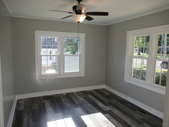 Building Photo - Check out this beautifully renovated white...