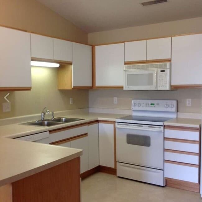 Building Photo - $1,250 | 2 Bedroom, 1 Bathroom Condo | Dog Friendly* | Available for August 1st, 2026 Move In!