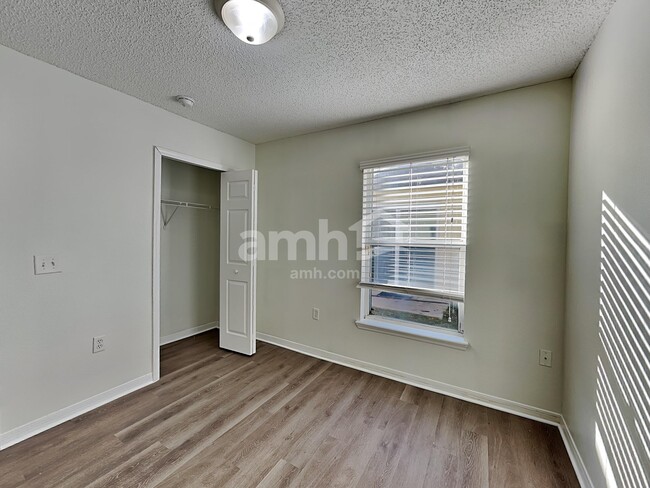 Building Photo - 7251 Lawn Tennis Ln