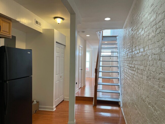 Building Photo - Charming 2-Bedroom, 1.5-Bathroom Brick Townhouse in Pigtown